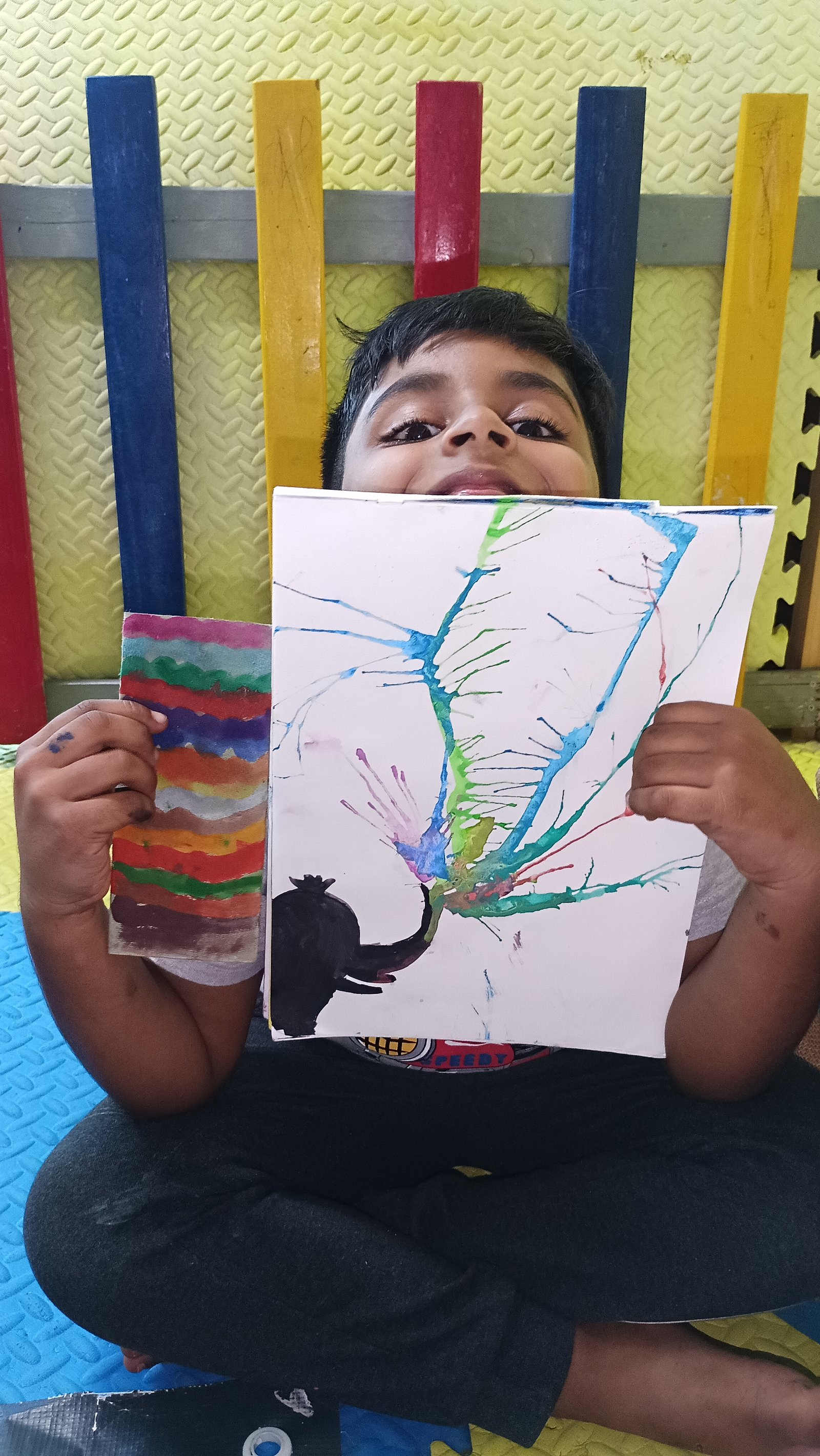 Traditional Warli painting mural created by young learners